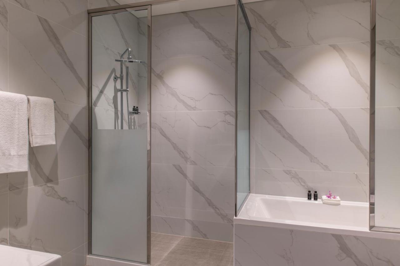 Steigenberger Residence Доха Екстер'єр фото A shower enclosure